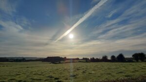 A bright sunrise over Ballymartin hill as viewed from Erkindale Drive.